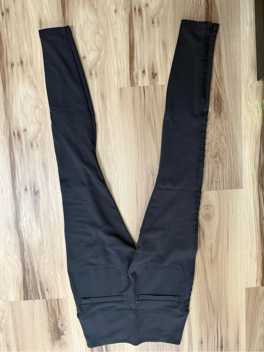Athleta Black Delancey Moto leggings.
